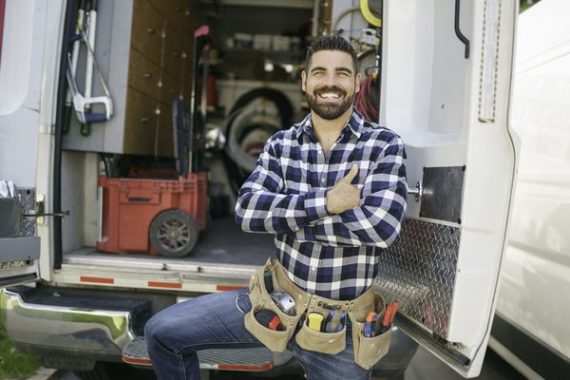 A Portrait of an electrician happy worker at work